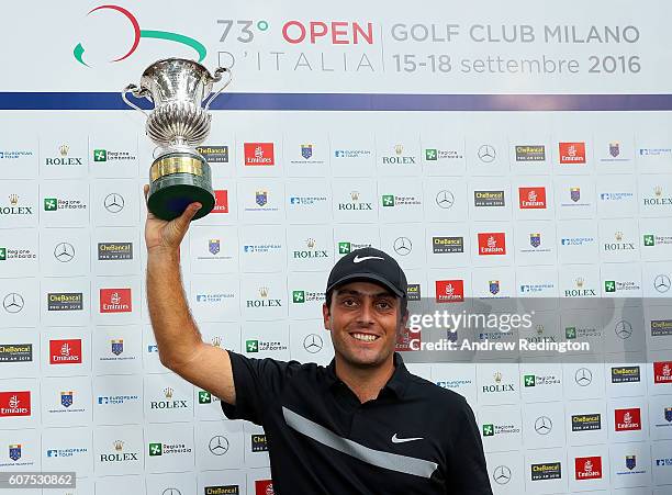 Francesco Molinari of Italy celebrates with the trophy after winning the Italian Open at Golf Club Milano - Parco Reale di Monza on September 18,...