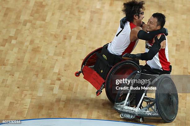 Daisuke Ikezaki of Japan celebrates with a teammate after winning the match against Canada in the Men's Wheelchair Rugby Bronze Medal match on day 11...