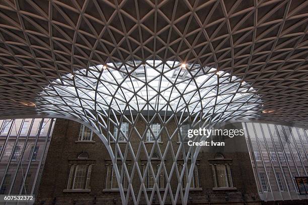 king's cross railway station - repetition architecture stock pictures, royalty-free photos & images