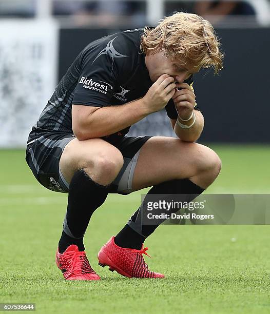 Joel Hodgson of Newcastle who missed with a drop goal with the last kick of the match which would have won the match, looks dejected after their...