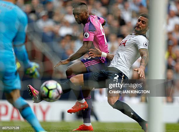 Sunderland's English striker Jermain Defoe has a shot which was saved by Tottenham Hotspur's French goalkeeper Hugo Lloris during the English Premier...