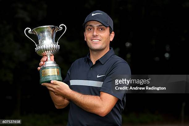 Francesco Molinari of Italy celebrates with the trophy after winning the Italian Open at Golf Club Milano - Parco Reale di Monza on September 18,...
