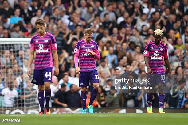 Sunderland players show dejection after Harry Kane of Tottenham Hotspur scores his sides first goal during the Premier League match between Tottenham...