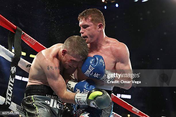 Liam Smith, left, fights Canelo Alvarez, right, during the Canelo v Smith - WBO Middleweight World Championship Fight at AT&T Stadium on September...