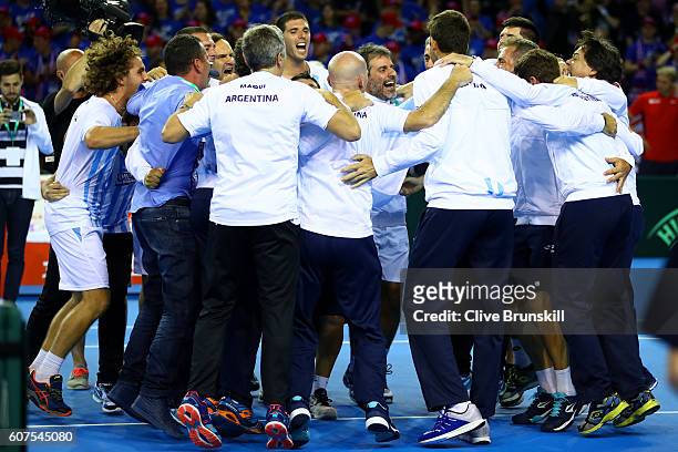 The Argentina team celebrates victory in the Davis Cup semi final between Great Britain and Argentina at Emirates Arena on September 18, 2016 in...
