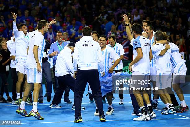 The Argentina team celebrates victory in the Davis Cup semi final between Great Britain and Argentina at Emirates Arena on September 18, 2016 in...