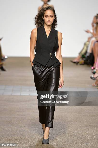 Model walks the runway at the Topshop Unique Spring Summer 2017 fashion show during London Fashion Week on September 18, 2016 in London, United...