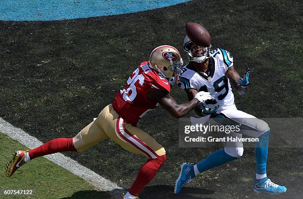 Tramaine Brock of the San Francisco 49ers defends a pass to Ted Ginn of the Carolina Panthers in the 1st quarter during the game at Bank of America...