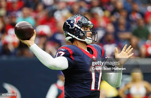 Brock Osweiler of the Houston Texans throws a pass in the second quarter of their game against the Kansas City Chiefs at NRG Stadium on September 18,...