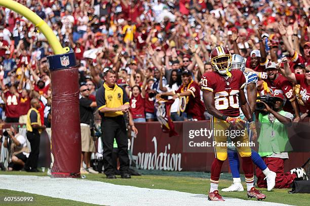 Wide receiver Jamison Crowder of the Washington Redskins celebrates after scoring a third quarter touchdown against the Dallas Cowboys at FedExField...