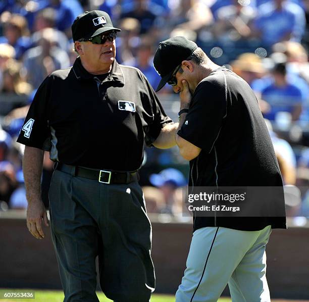 Head coach Robin Ventura of the Chicago White Sox listens to umpire Jerry Layne during a play review in the second inning against the Kansas City...