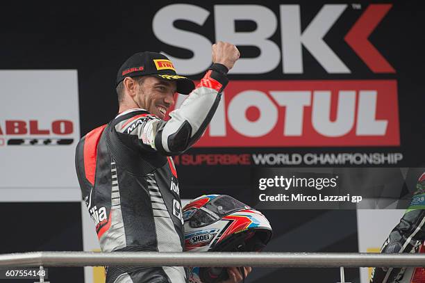 Alex De Angelis of Rep. San Marino and IodaRacing Team celebrates the second place on the podium at the end of the World Superbike Race 2 during the...