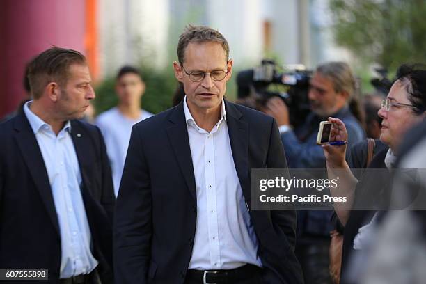 Michael Mueller, leading candidate and chairman of the Berlin SPD, comes to choose the polling station in the OSZ Lotis in the auditorium in...