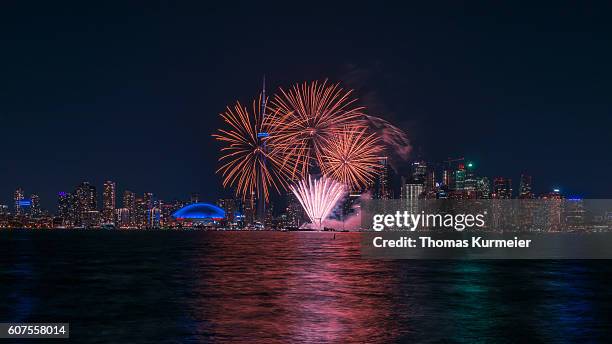 toronto - canada day fireworks - cn tower and fireworks stock pictures, royalty-free photos & images