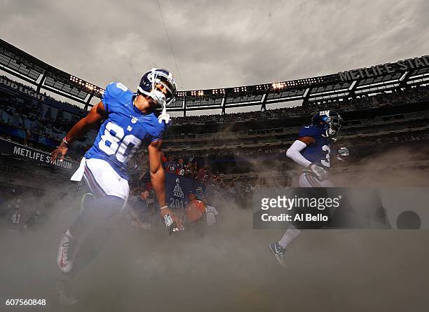 Victor Cruz of the New York Giants enters the field against the New Orleans Saints before their game at MetLife Stadium on September 18, 2016 in East...