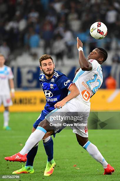 Lucas Tousart of Lyon and Aaron Leya Iseka of Marseille during the French Ligue 1 match between Olympique de Marseille and Olympique Lyonnais at...