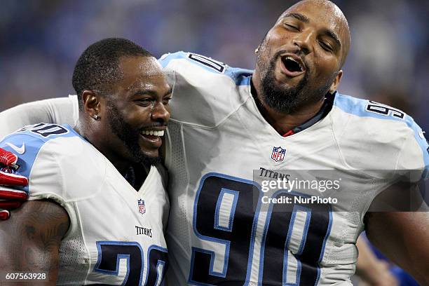 Tennessee Titans cornerback Perrish Cox , left, and defensive end DaQuan Jones celebrate the 16-15 victory over the Detroit Lions in Detroit,...