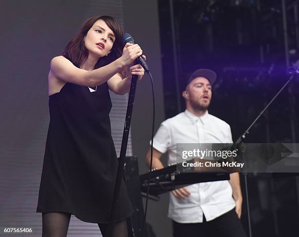 Lauren Mayberry and Martin Doherty of Chvrches performs during Music Midtown at Piedmont Park on September 17, 2016 in Atlanta, Georgia.