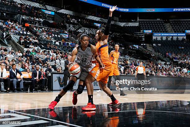 Vicki Baugh of the San Antonio Stars handles the ball against Kelsey Bone of the Phoenix Mercury on September 18, 2016 at AT&T Center in San Antonio,...