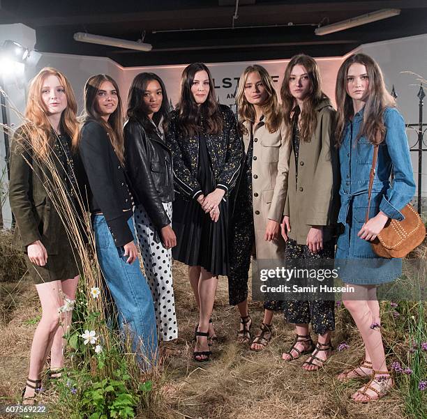 Liv Tyler poses with models at the Belstaff Presentation during London Fashion Week Spring/Summer collections 2016/2017 on September 18, 2016 in...