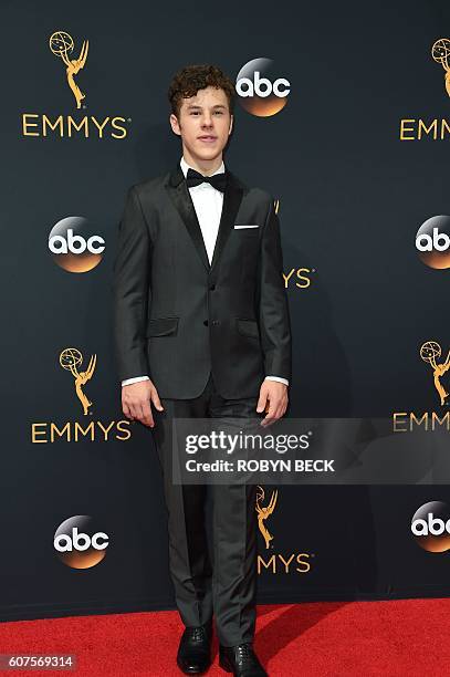 Actor Nolan Gould arrives for the 68th Emmy Awards on September 18, 2016 at the Microsoft Theatre in Los Angeles. / AFP / Robyn Beck