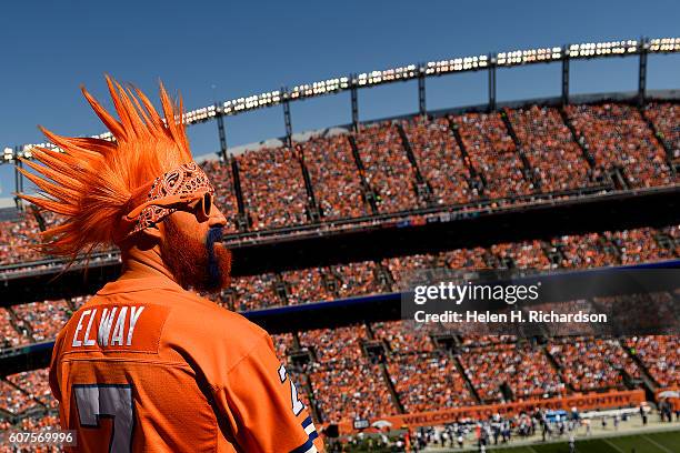 Denver Broncos fan in a John Elway jersey rocks face paint during the first quarter. The Denver Broncos hosted the Indianapolis Colts on Sunday,...