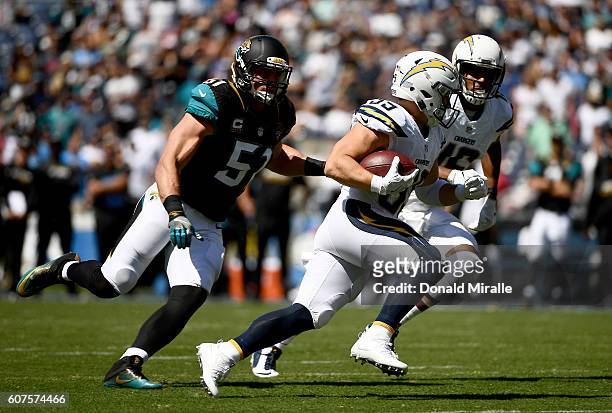 Danny Woodhead of the San Diego Chargers runs with the ball against the Jacksonville Jaguars during the first half of a game at Qualcomm Stadium on...