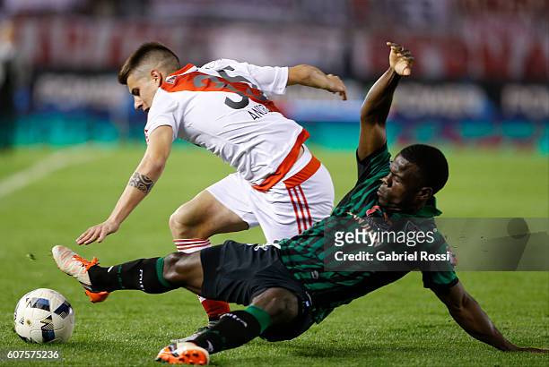 Tomas Andrade of River Plate fights for the ball with Mauricio Casierra of San Martin during a match between River Plate and San Martin as part of...