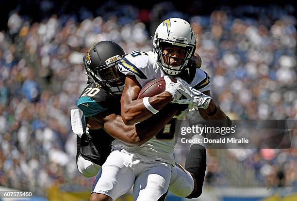 Wide receiver Tyrell Williams of the San Diego Chargers runs after the catch against Jalen Ramsey of the Jacksonville Jaguars during the first half...