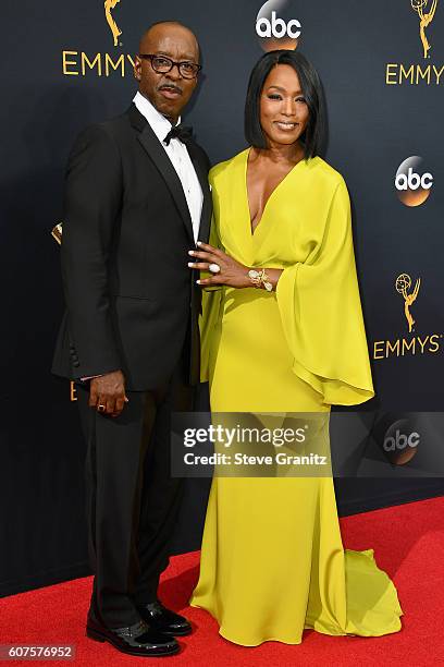 Actor Courtney B. Vance and actress Angela Bassett attend the 68th Annual Primetime Emmy Awards at Microsoft Theater on September 18, 2016 in Los...