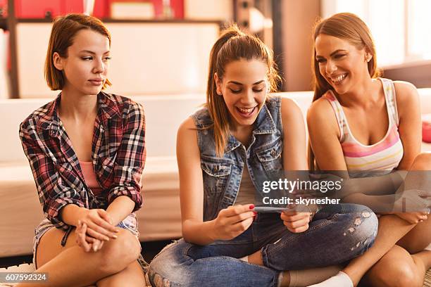 young woman felling excited for pregnancy test outcome. - jealousy stock pictures, royalty-free photos & images