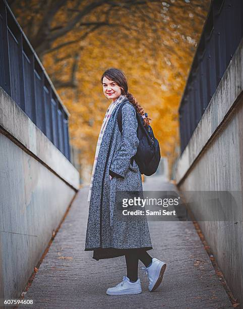 female student urban posing in autumn time - november 22 stock pictures, royalty-free photos & images
