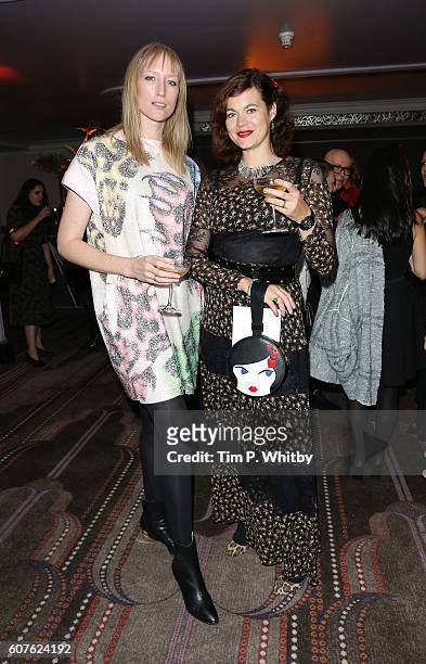 Jade Parfitt and Jasmine Guiness attend the Charlotte Olympia show during London Fashion Week Spring/Summer collections 2017 at Park Lane Hotel on...