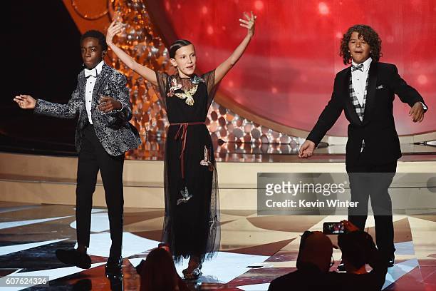 Actors Caleb McLaughlin, Millie Bobby Brown and Gaten Matarazzo perform onstage during the 68th Annual Primetime Emmy Awards at Microsoft Theater on...