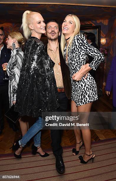 Poppy Delevingne, Matthew Williamson and Jessica Hart attend the launch of "Vogue: Voice Of A Century", a new book celebrating Vogue Britain's...