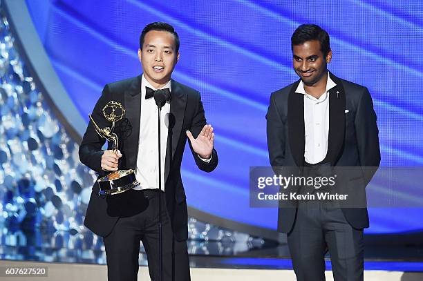 Actor/writer Aziz Ansari and writer Alan Yang accept Outstanding Writing for a Comedy Series for the 'Master of None' episode 'Parents' onstage...