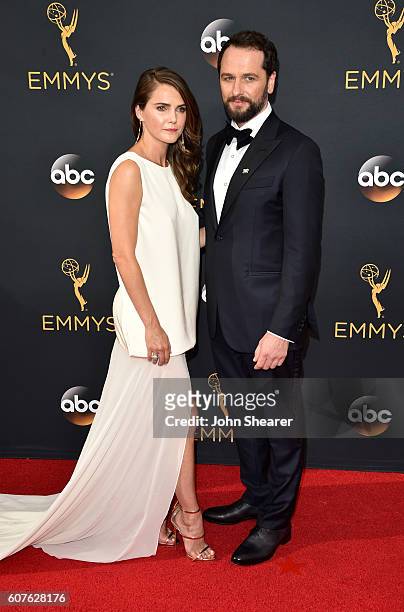 Actress Keri Russell and Matthew Rhys arrive at the 68th Annual Primetime Emmy Awards at Microsoft Theater on September 18, 2016 in Los Angeles,...