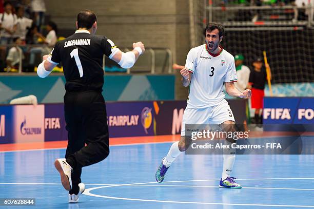 Farhad Tavakoli and Ahmad Esmaeilpour of Iran celebrate after their teammate Farhad Tavakoli scores his team's second goal during the FIFA Futsal...