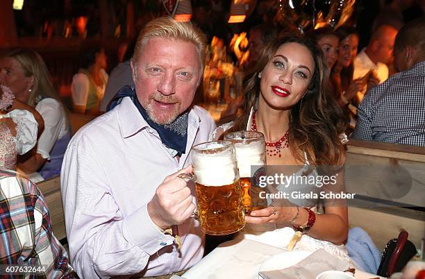 Boris Becker and his wife Lilly Becker during the 'Almauftrieb' as part of the Oktoberfest 2016 at Kaeferschaenke beer tent on September 18, 2016 in...