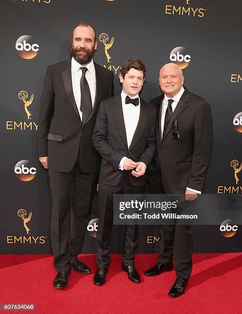 Actors Rory McCann, Iwan Rheon and Conleth Hill attend the 68th Annual Primetime Emmy Awards at Microsoft Theater on September 18, 2016 in Los...
