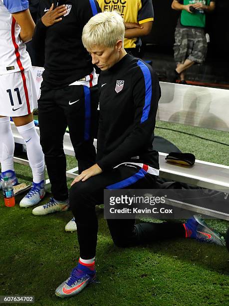 Megan Rapinoe kneels during the National Anthem prior to the match between the United States and the Netherlands at Georgia Dome on September 18,...