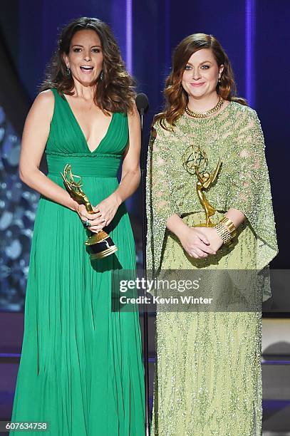 Actresses Tina Fey and Amy Poehler speak onstage during the 68th Annual Primetime Emmy Awards at Microsoft Theater on September 18, 2016 in Los...