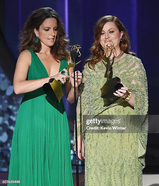 Actresses Tina Fey and Amy Poehler speak onstage during the 68th Annual Primetime Emmy Awards at Microsoft Theater on September 18, 2016 in Los...