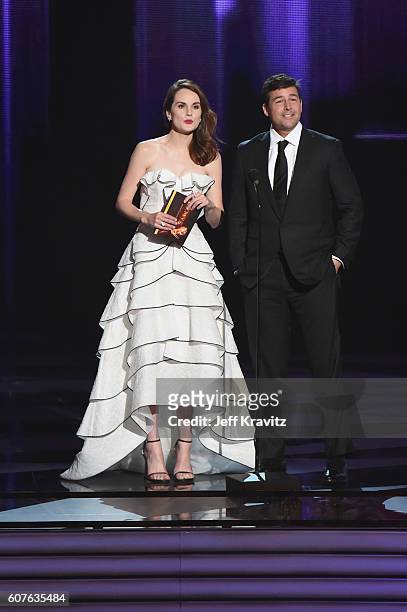 Actors Michelle Dockery and Kyle Chandler speak onstage during the 68th Annual Primetime Emmy Awards at Microsoft Theater on September 18, 2016 in...