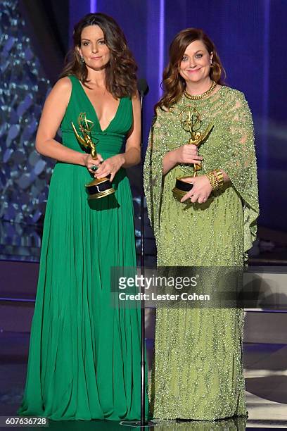 Actresses Tina Fey and Amy Poehler speak onstage during the 68th Annual Primetime Emmy Awards at Microsoft Theater on September 18, 2016 in Los...