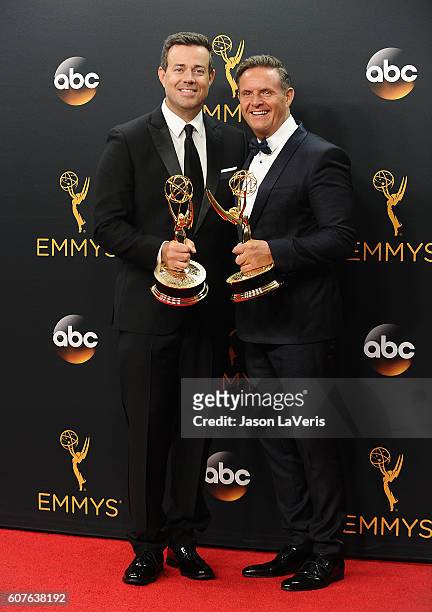 Carson Daly and Mark Burnett pose in the press room at the 68th annual Primetime Emmy Awards at Microsoft Theater on September 18, 2016 in Los...