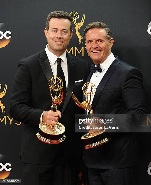 Carson Daly and Mark Burnett pose in the press room at the 68th annual Primetime Emmy Awards at Microsoft Theater on September 18, 2016 in Los...