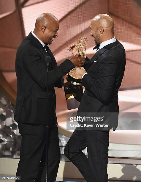 Actor/writer Keegan-Michael Key accepts Outstanding Variety Sketch Series for 'Key & Peele' from actor Damon Wayans onstage during the 68th Annual...