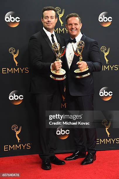 Personality Carson Daly and producer Mark Burnett, winners of Outstanding Reality-Competition Program for "The Voice," pose in the press room at the...
