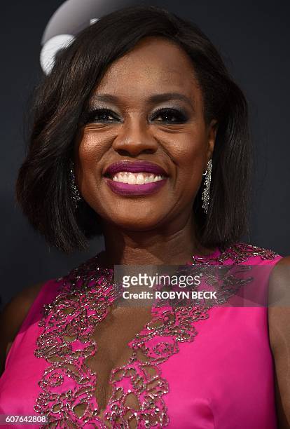 Outstanding lead actress in a drama series "How To Get Away with Murder" nominee Viola Davis arrives for the 68th Emmy Awards on September 18, 2016...